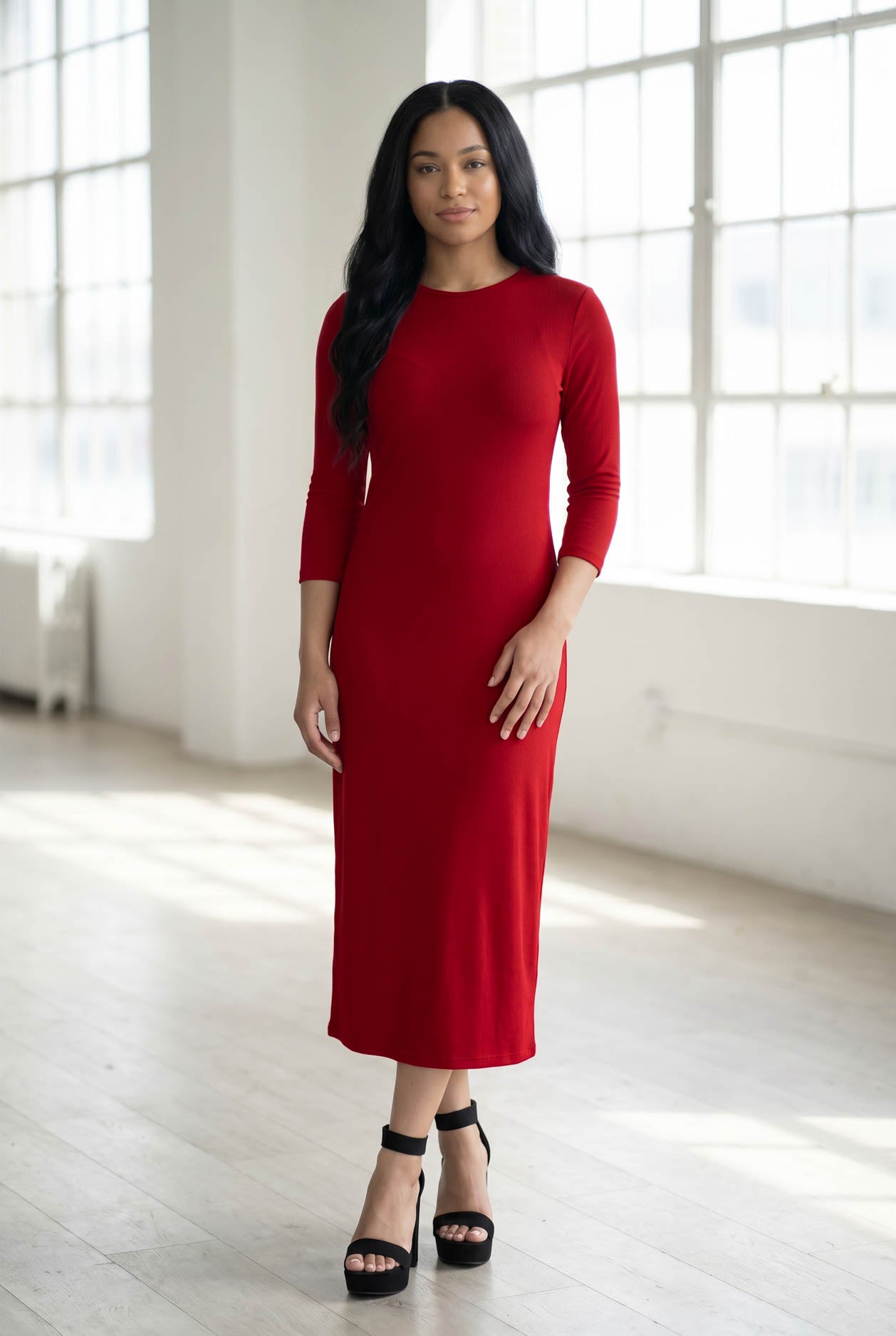 Model wearing Nuggles® Ribbed Layering Dress in Brick Red