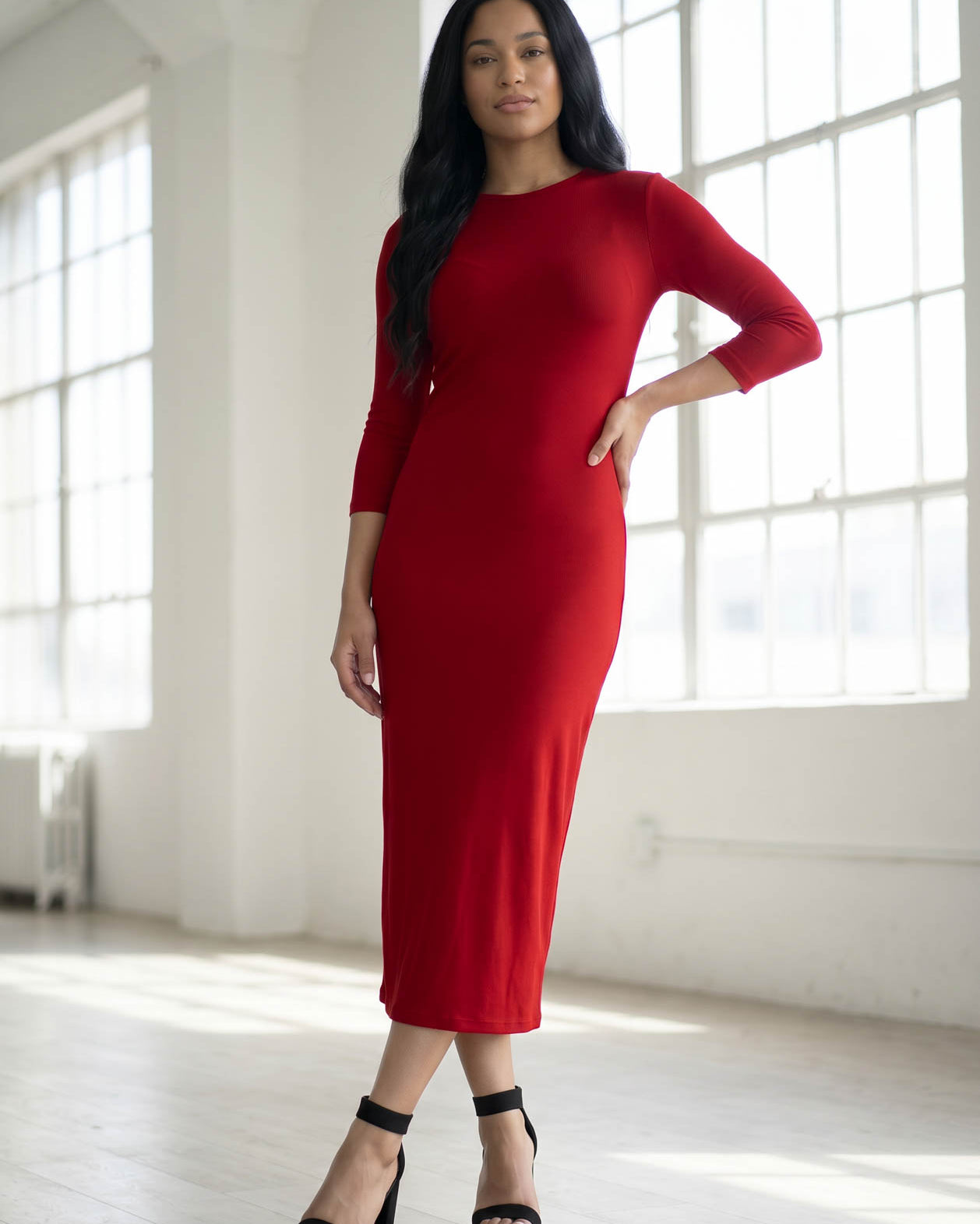 Model wearing Nuggles® Ribbed Layering Dress in Brick Red