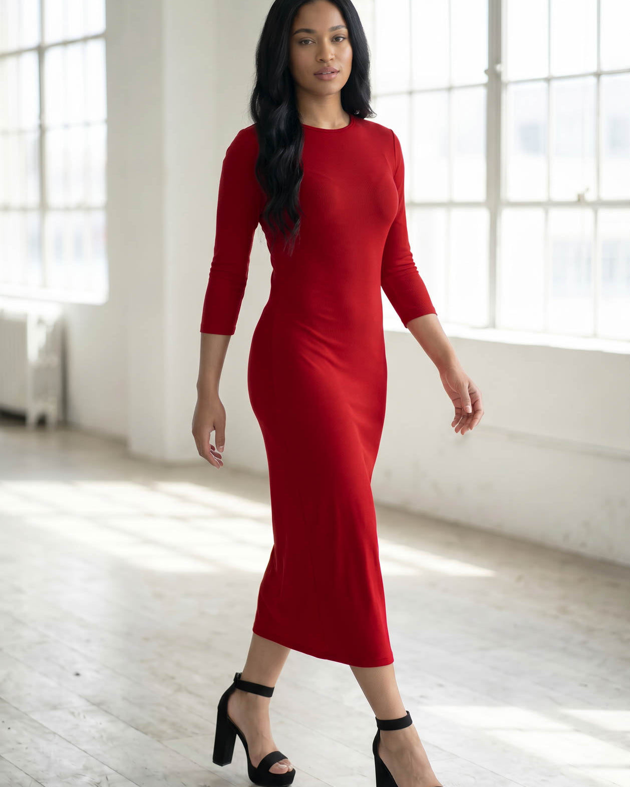 Model wearing Nuggles® Ribbed Layering Dress in Brick Red