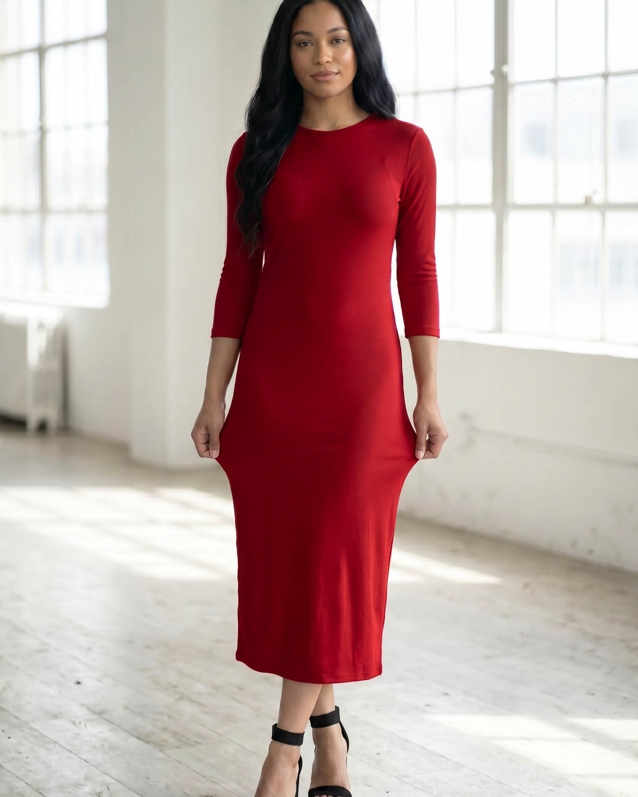Model wearing Nuggles® Ribbed Layering Dress in Brick Red