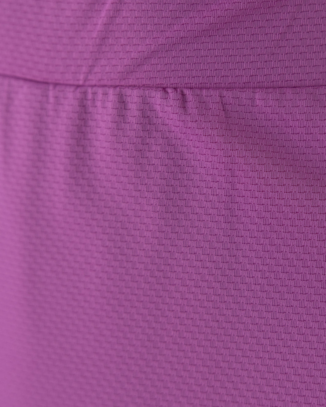 Model wearing Nuggles® 27" All-Sport Skirt in Bubble Gum