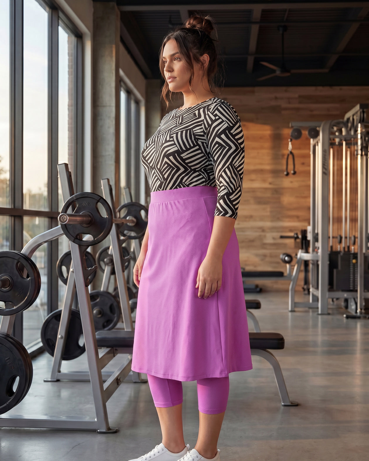 Model wearing Nuggles® 27" All-Sport Skirt in Bubble Gum