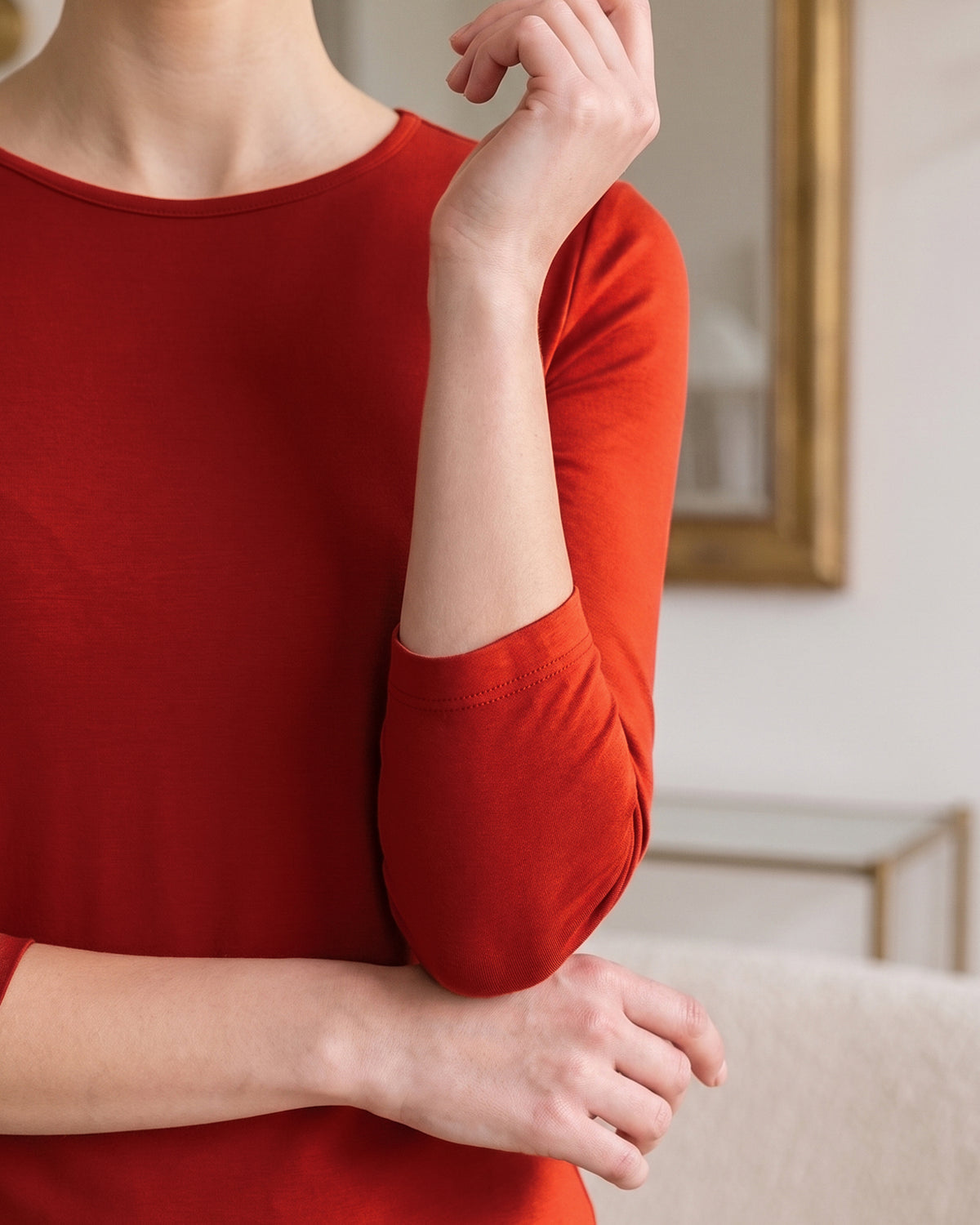 Model wearing Nuggles® Essential 3/4 Sleeve Tee in Burnt Orange