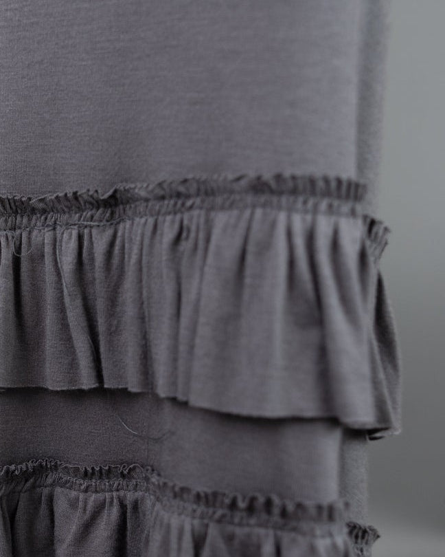 Model wearing Nuggles® Callie Skirt in Steel Gray