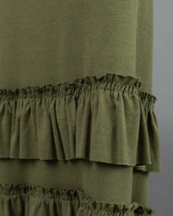 Model wearing Nuggles® Callie Skirt in Olive