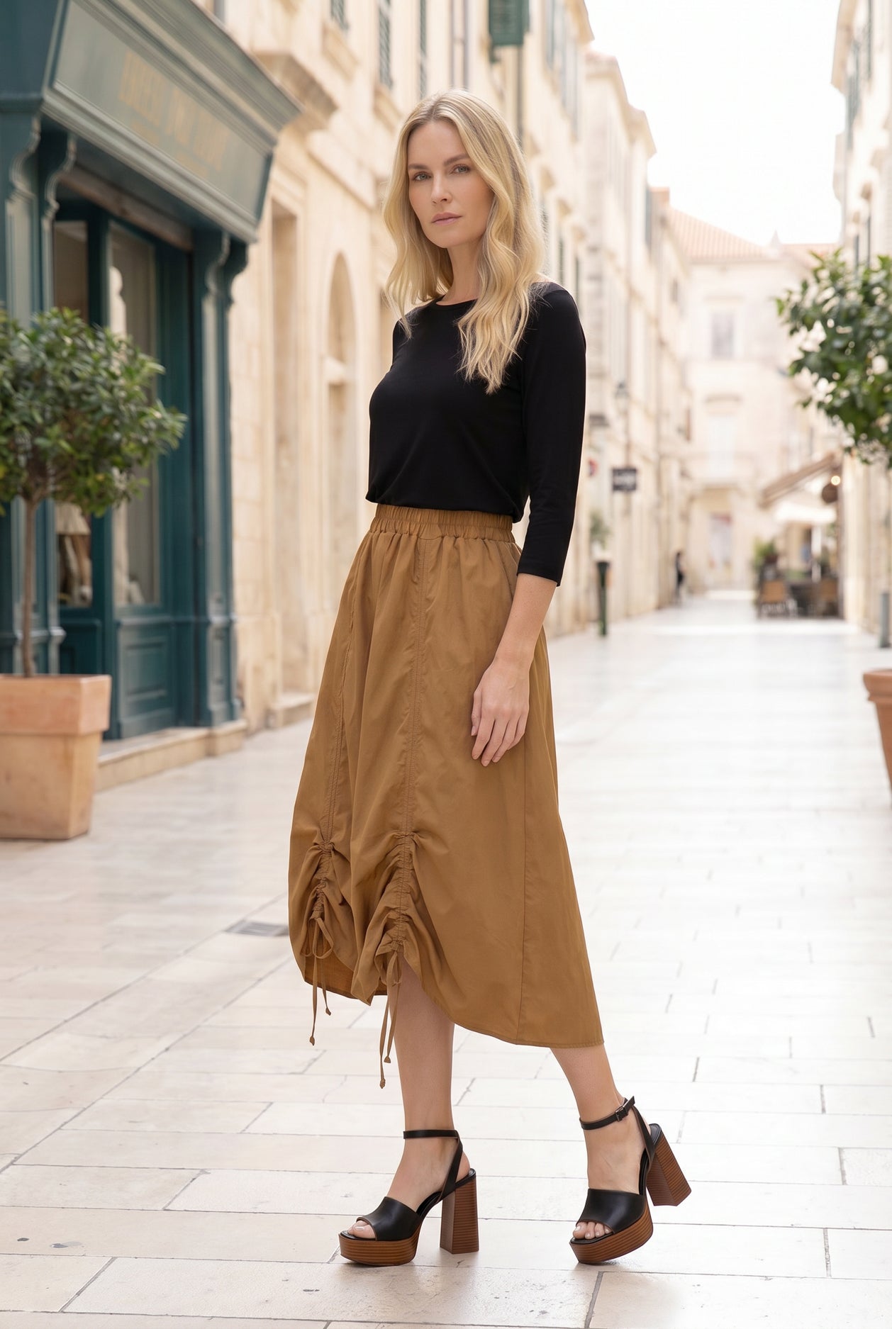 Model wearing Nuggles® Oriana Skirt in Camel
