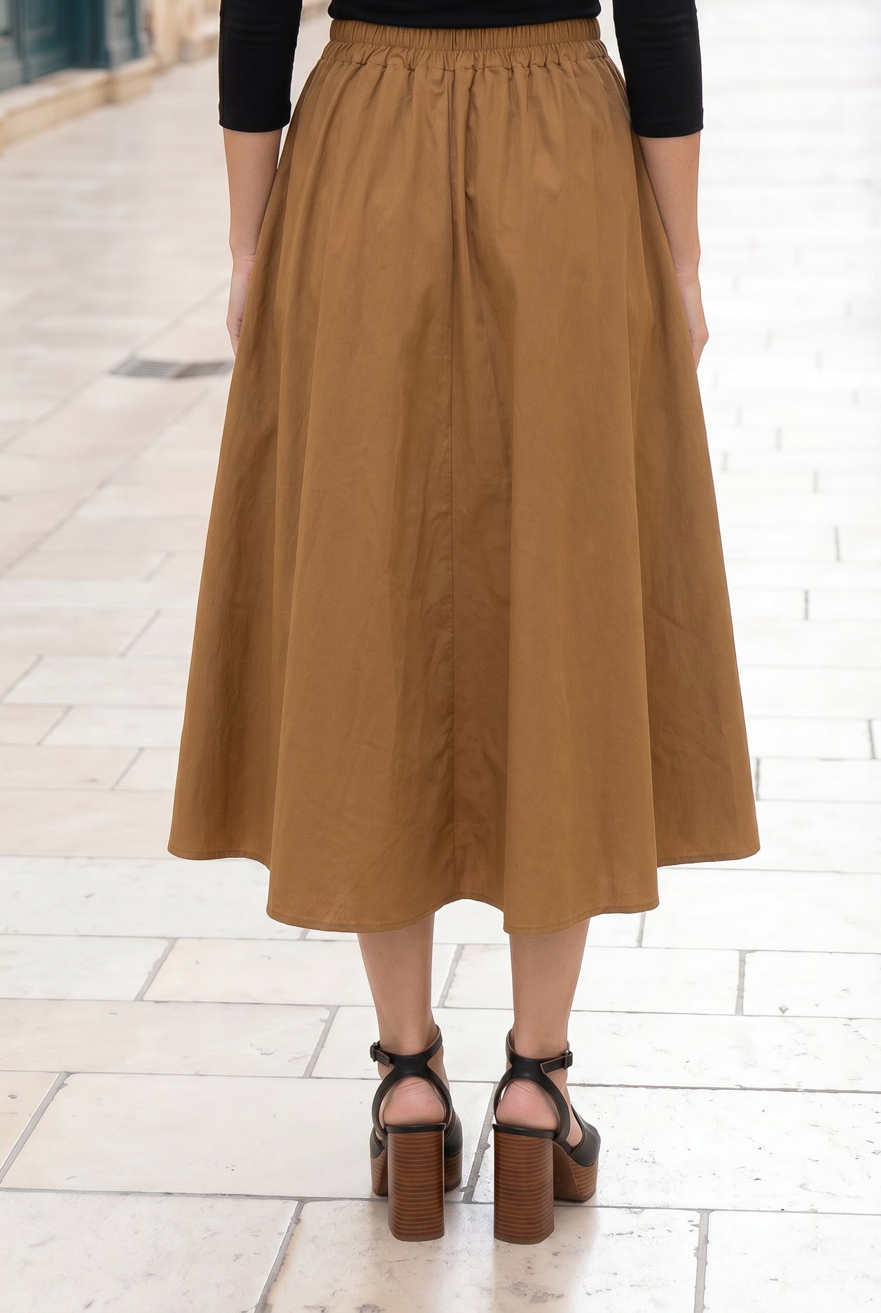 Model wearing Nuggles® Oriana Skirt in Camel