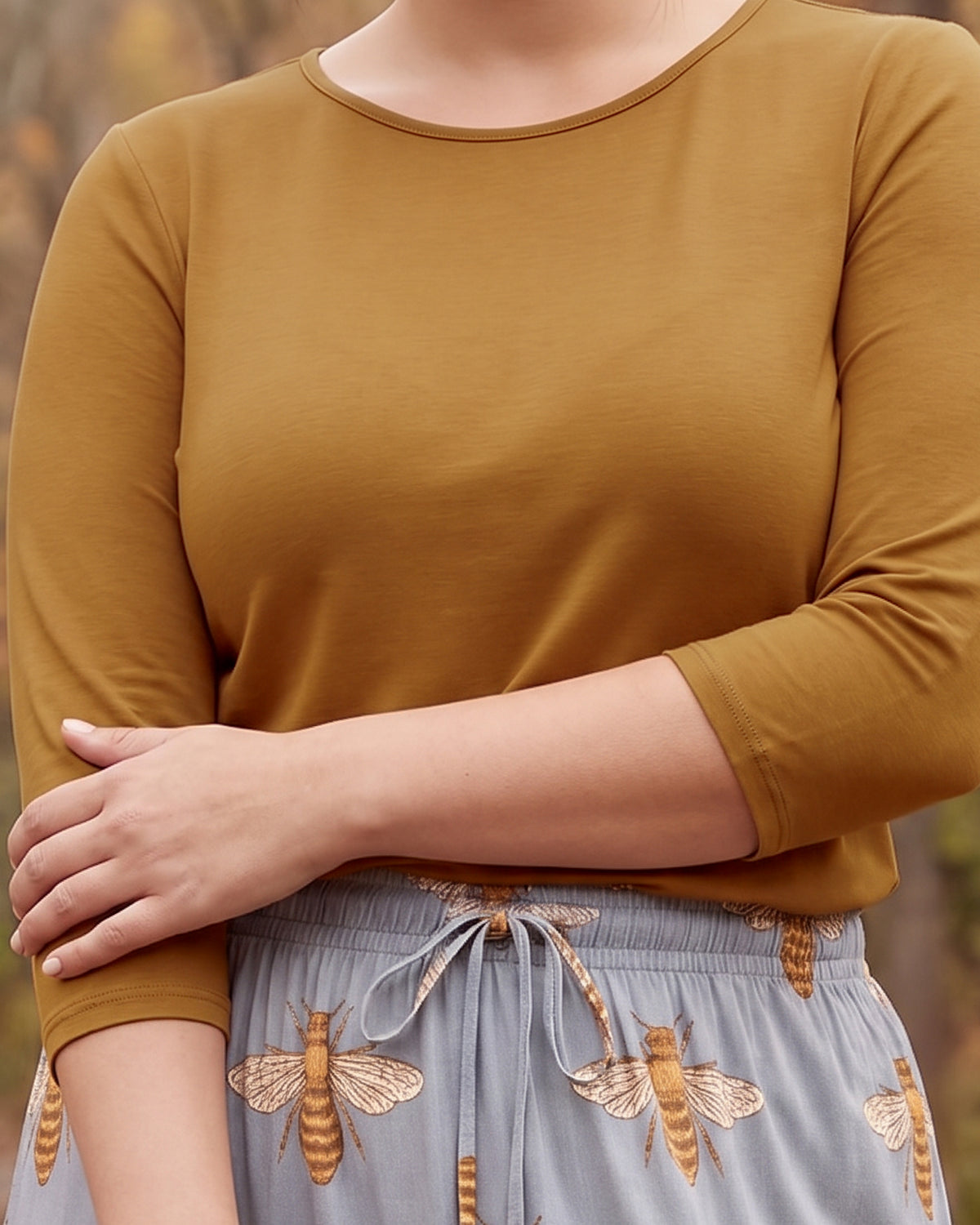 Model wearing Nuggles® Essential 3/4 Sleeve Tee in Camel