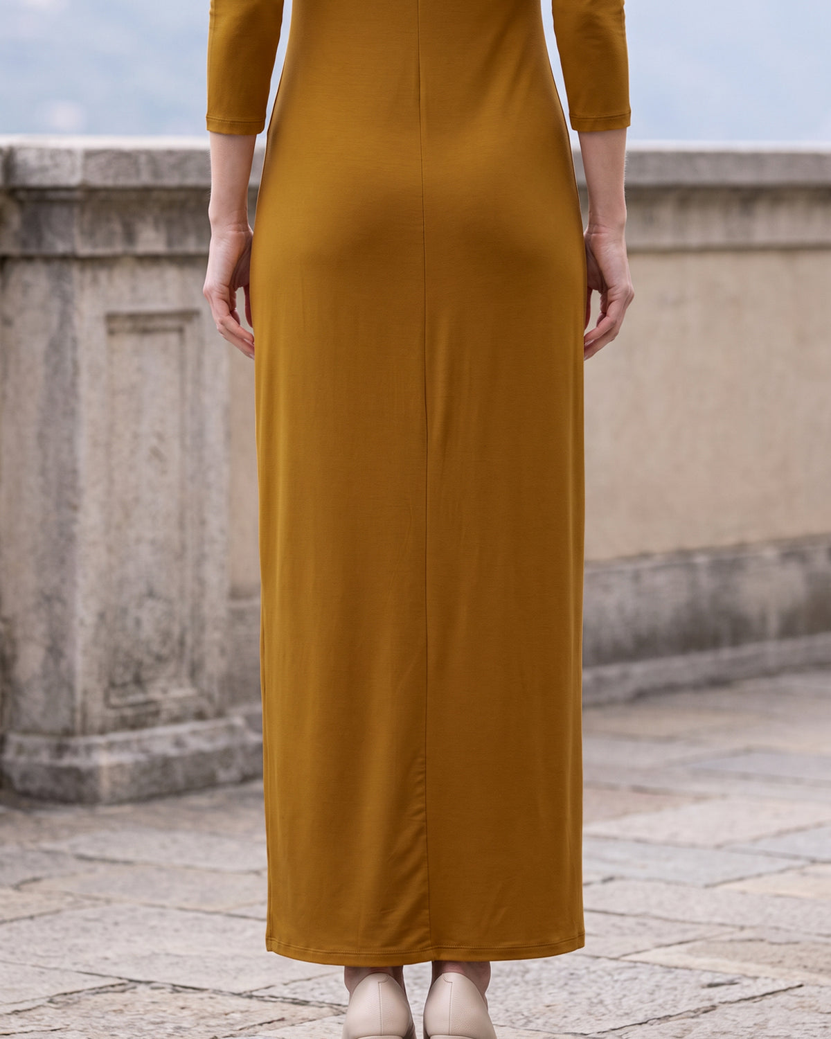 Model wearing Nuggles® Maxi Layering Dress in Camel