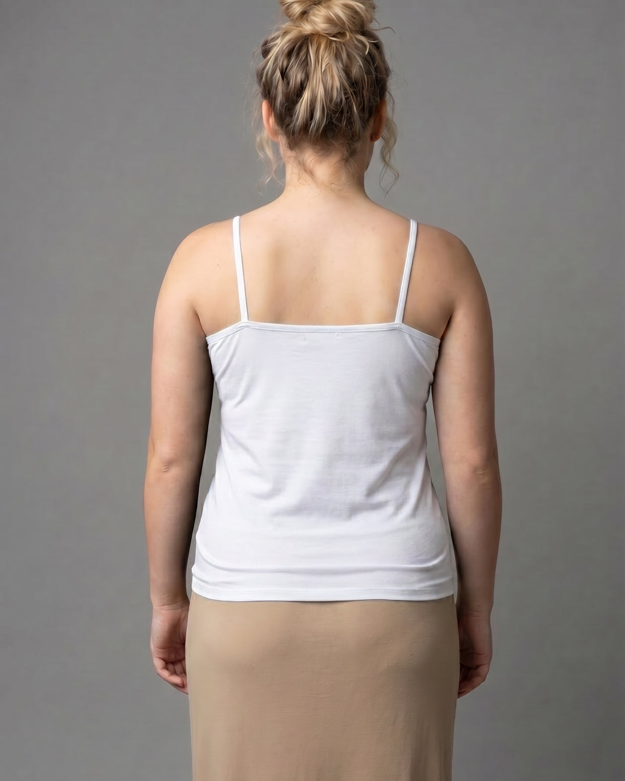 Model wearing Nuggles® Camisole in White
