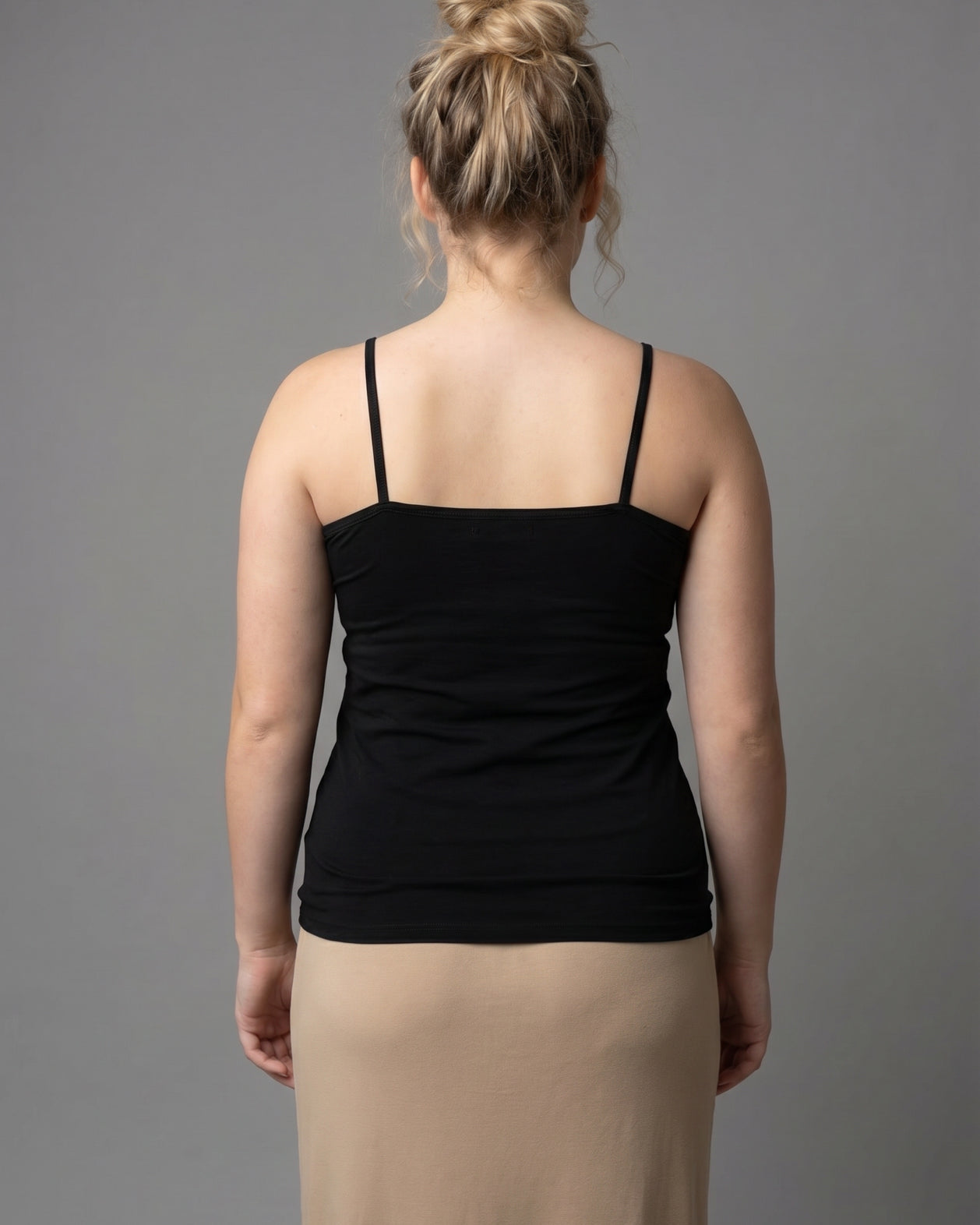 Model wearing Nuggles® Camisole in Black