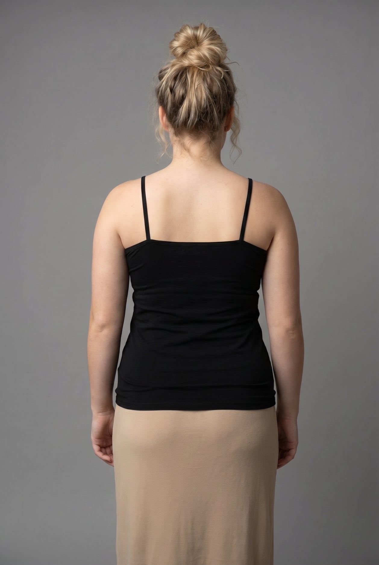 Model wearing Nuggles® Camisole in Black