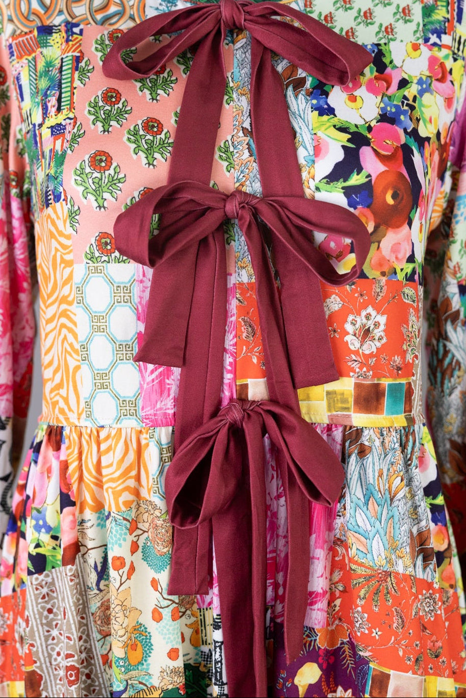 Model wearing Nuggles® Addison Dress in Carousel