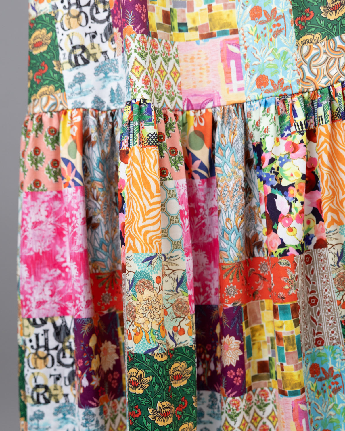 Model wearing Nuggles® Sage Skirt in Carousel