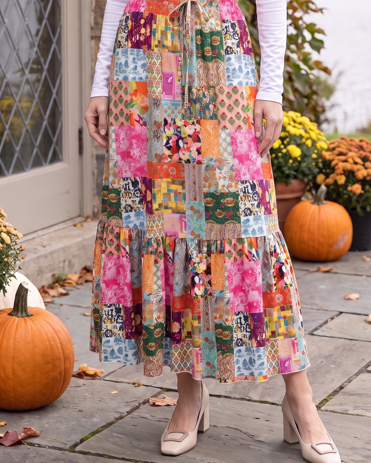 Model wearing Nuggles® Sage Skirt in Carousel