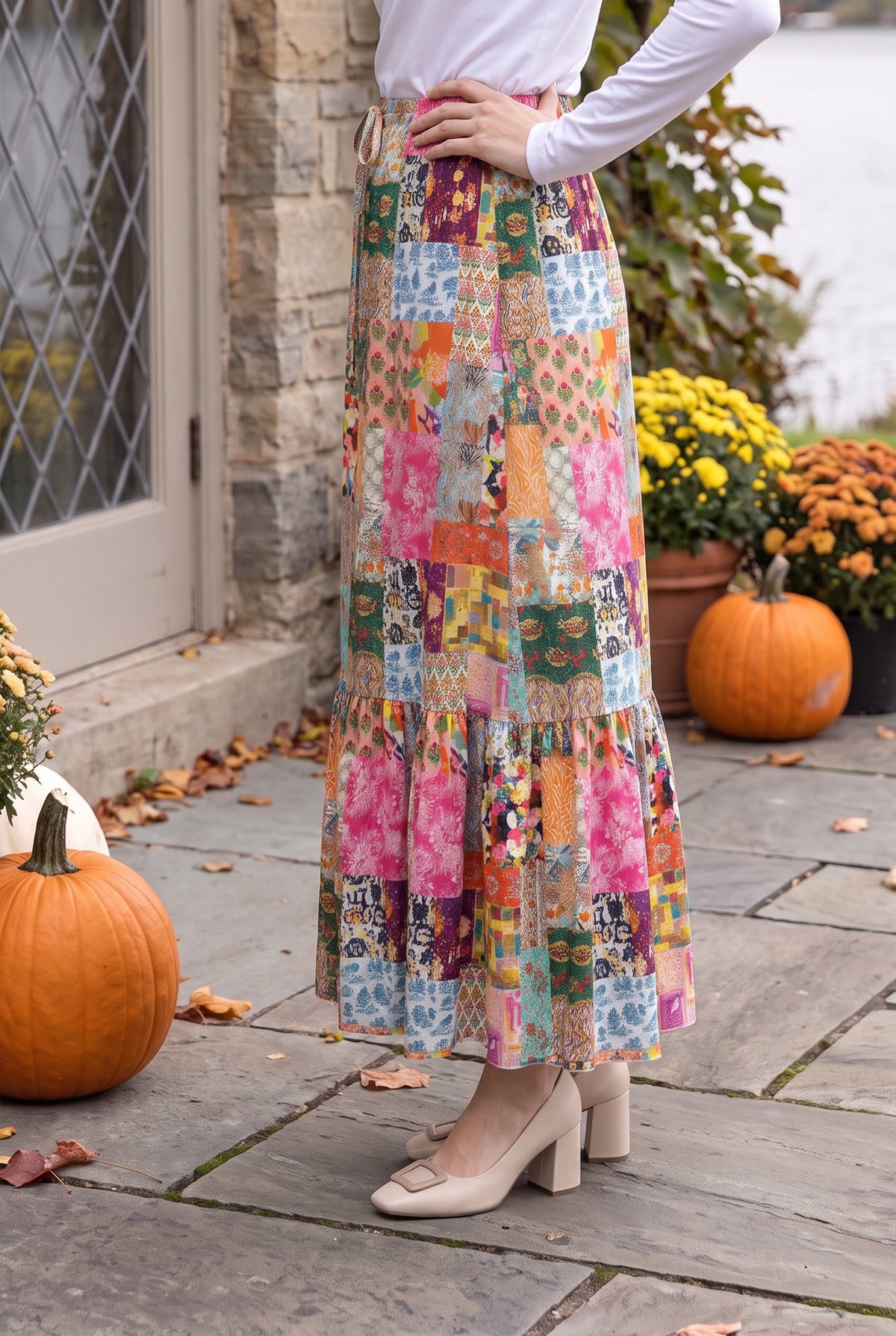 Model wearing Nuggles® Sage Skirt in Carousel