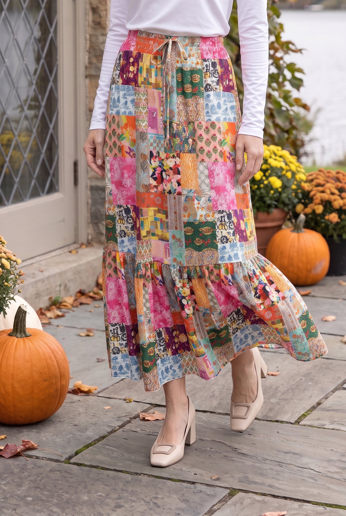 Model wearing Nuggles® Sage Skirt in Carousel