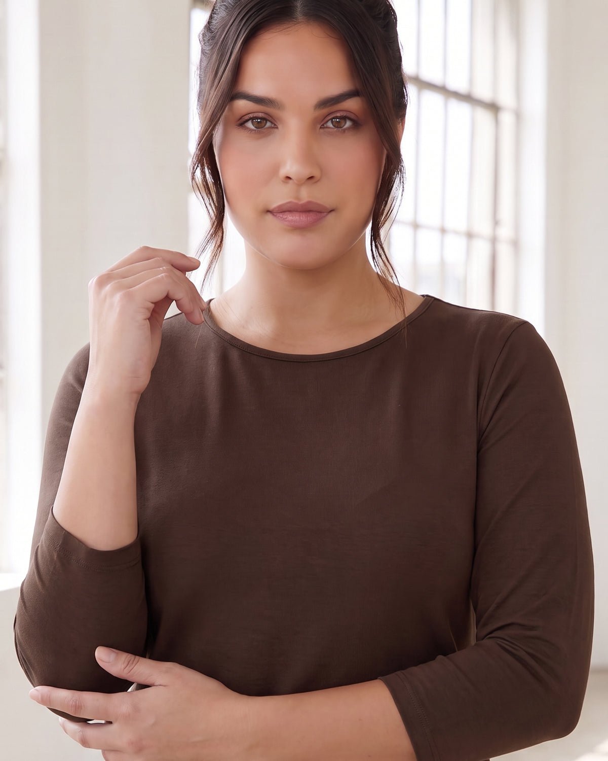 Model wearing Nuggles® Essential 3/4 Tee in Chocolate Brown