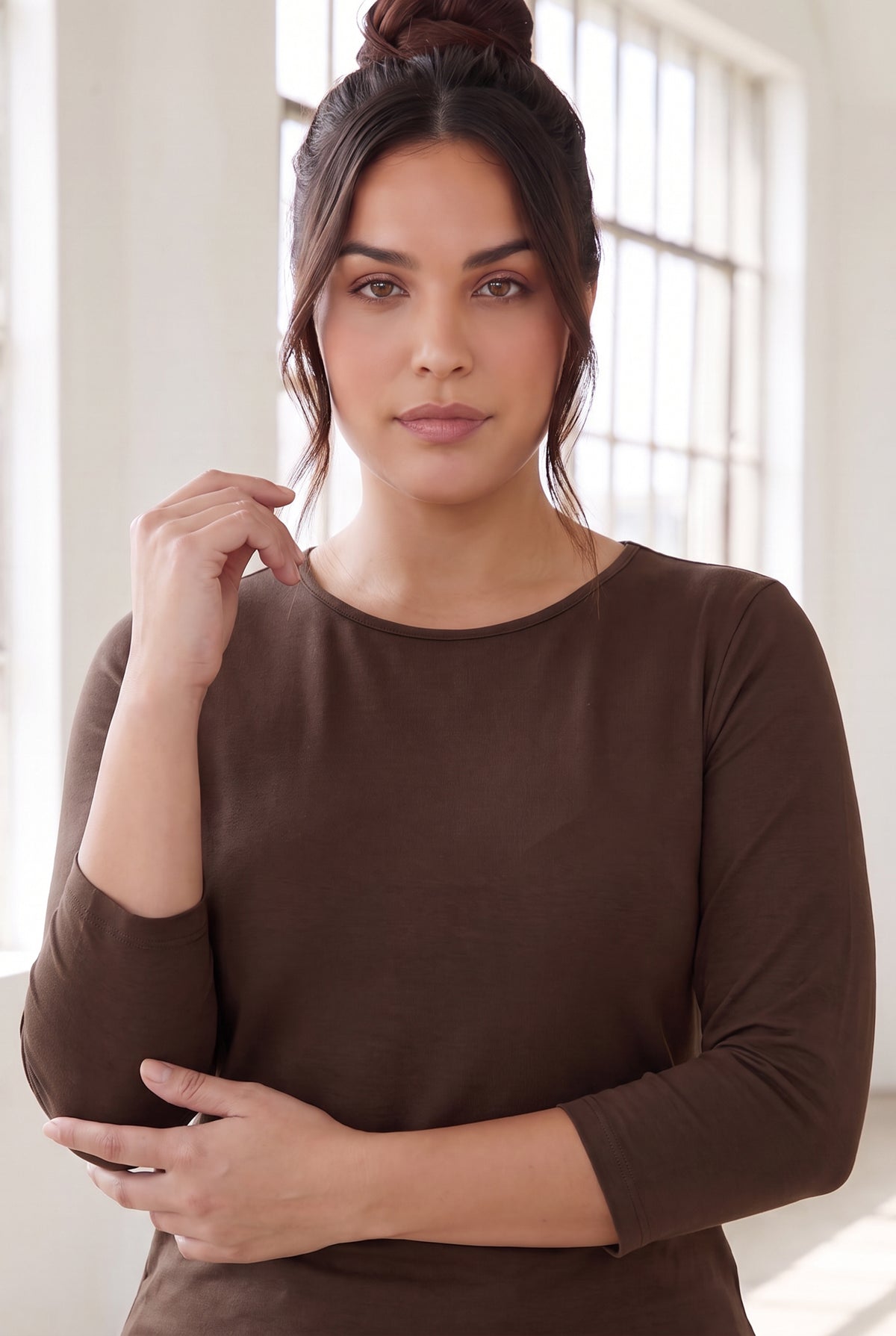Model wearing Nuggles® Essential 3/4 Tee in Chocolate Brown