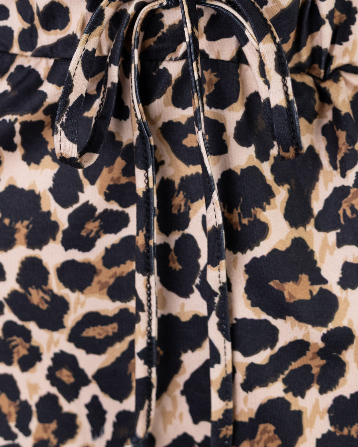 Model wearing Nuggles® 31" Drawstring Skirt in Classic Leopard