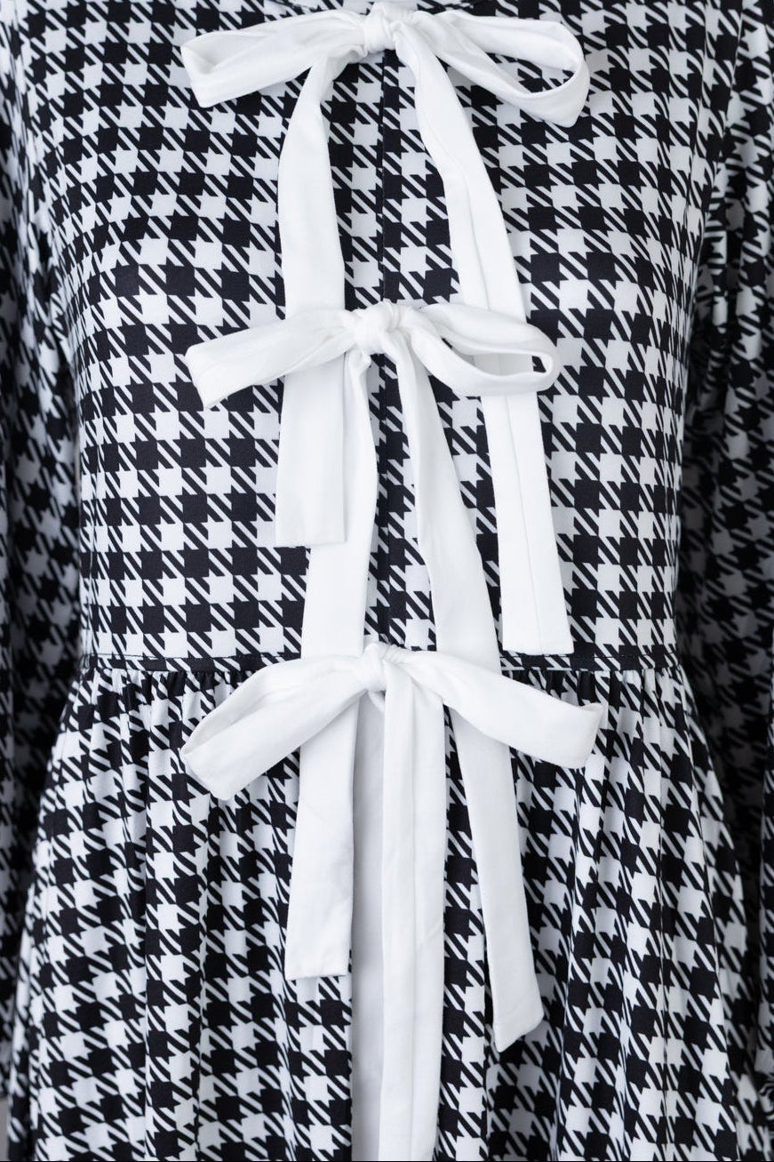 Model wearing Nuggles® Addison Dress in Cookie Check