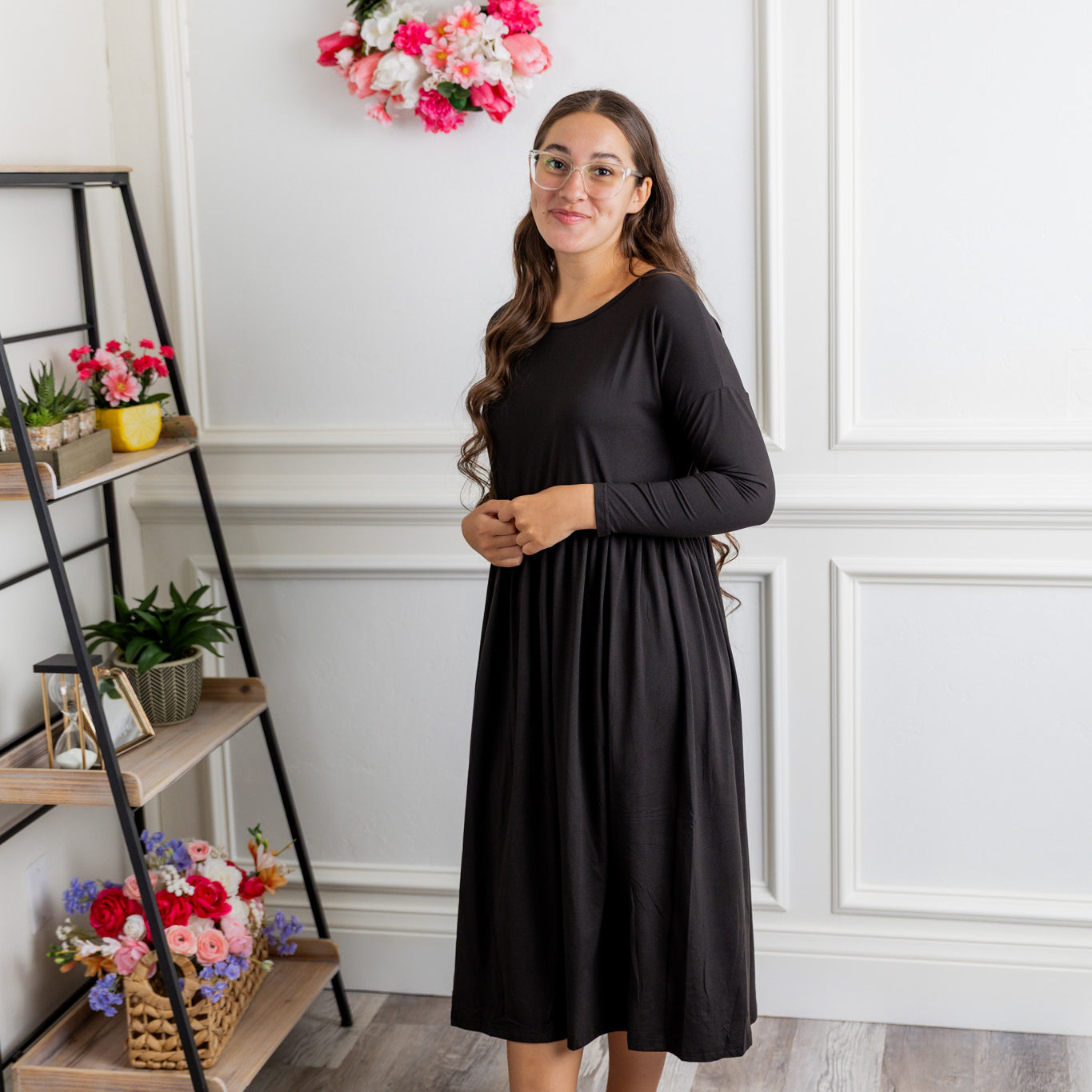 Nuggles® Farah Dress in solid color, modest long sleeve midi dress with empire waist, styled with flats for everyday wear.