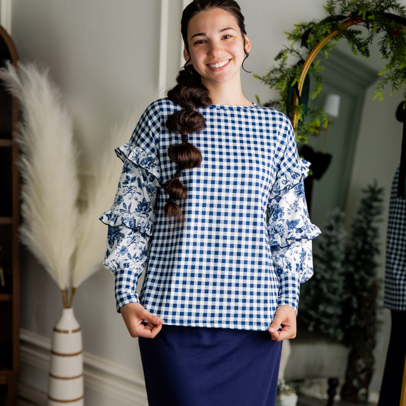 Nuggles® Rilynn Top – modest women’s printed top with ruffled sleeves and relaxed fit.