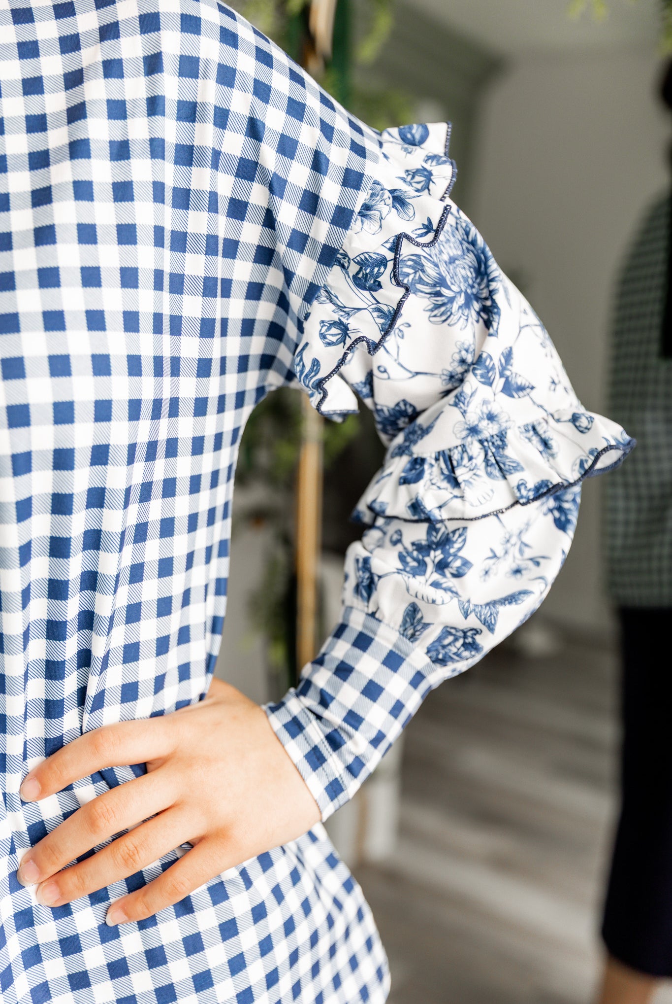 Nuggles® Rilynn Top – modest women’s printed top with ruffled sleeves and relaxed fit.