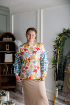 Nuggles® Rilynn Top – modest women’s printed top with ruffled sleeves and relaxed fit.