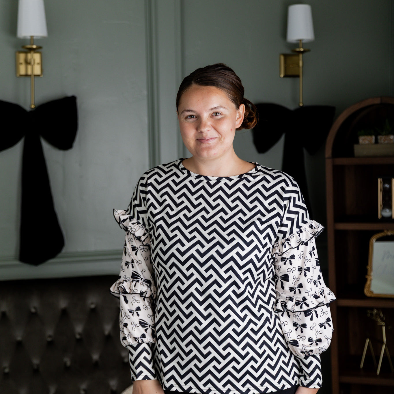 Nuggles® Rilynn Top – modest women’s printed top with ruffled sleeves and relaxed fit.