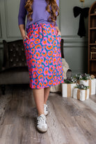 Model wearing Nuggles® 27 inch Sport Flex Skirt with pockets and drawstring waistband