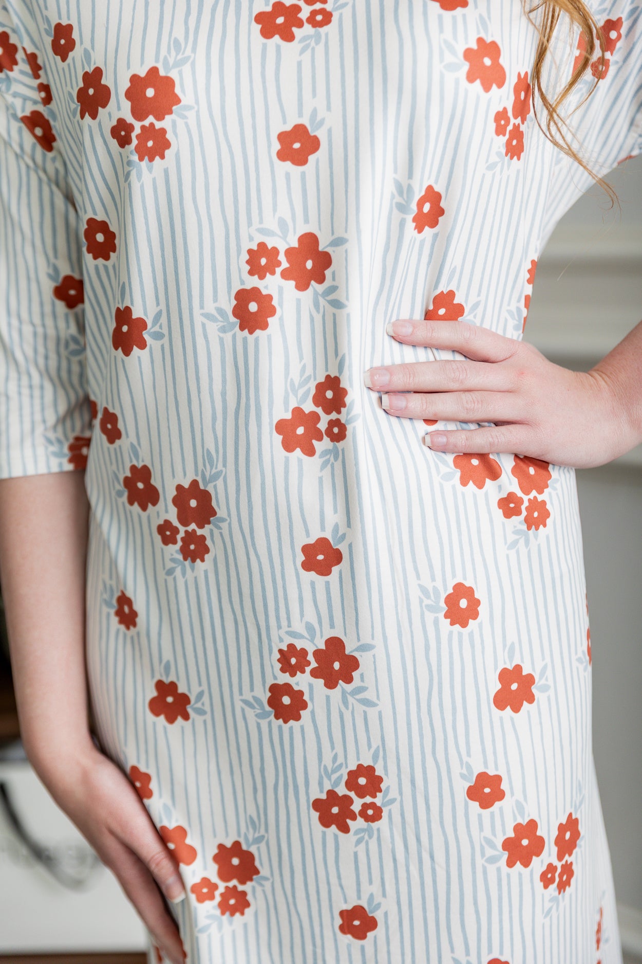 Model wearing Nuggles® Heather Dress in Rosebud Pinstripe