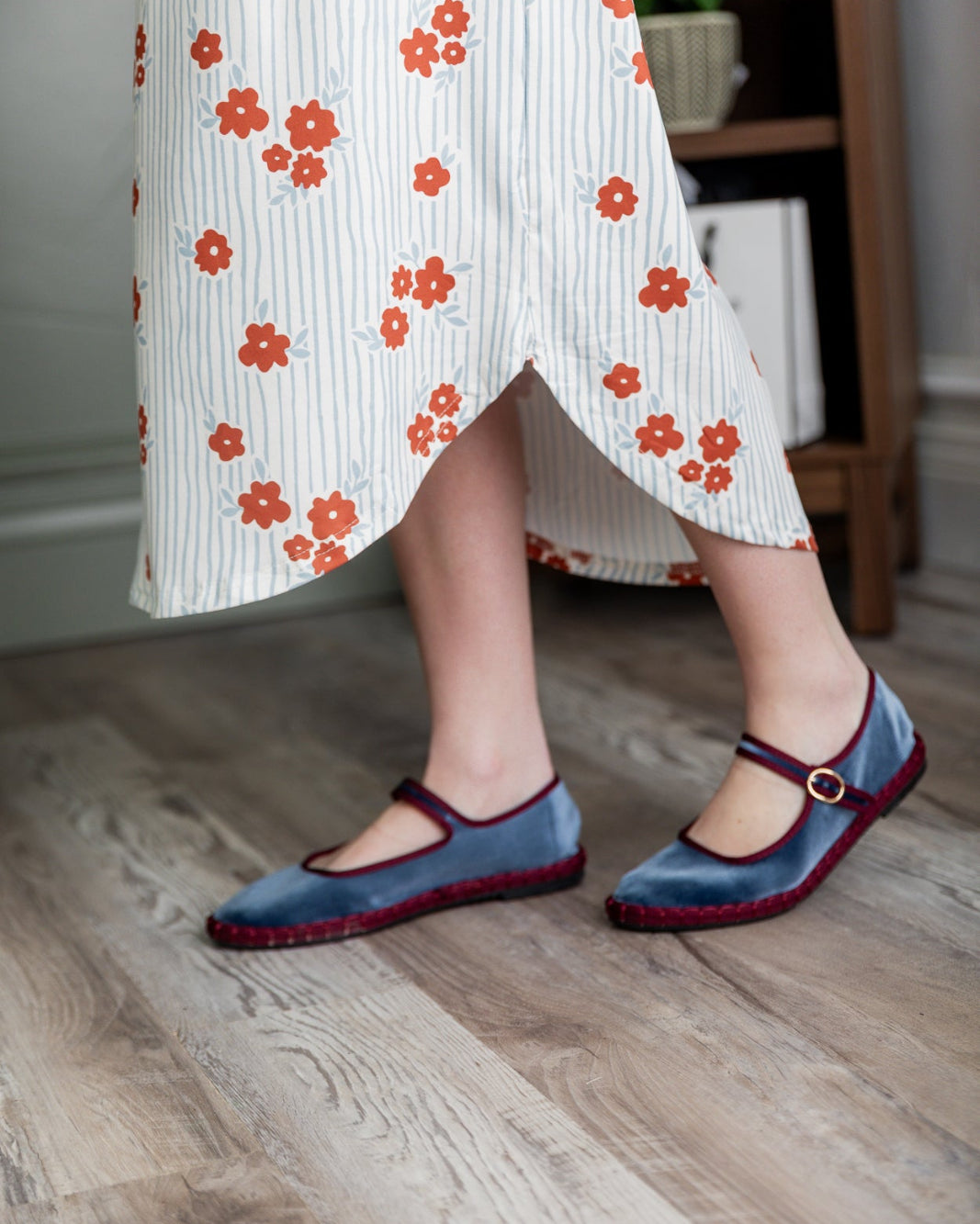 Model wearing the Nuggles® Heather Dress in Rosebud Pinstripe