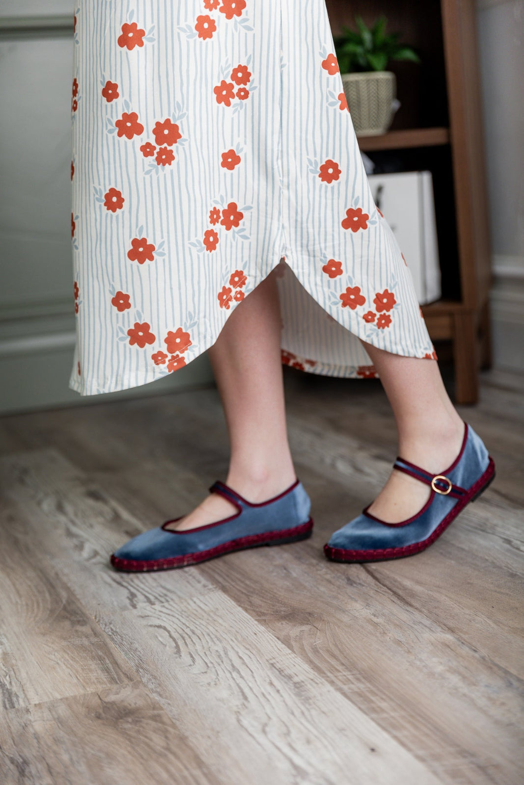 Model wearing the Nuggles® Heather Dress in Rosebud Pinstripe