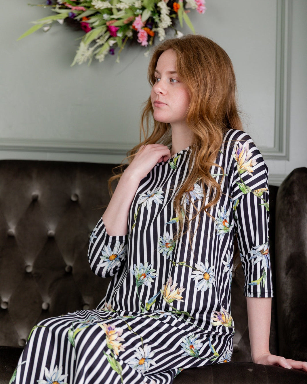 Model wearing the Nuggles® Heather Dress in Daisy Stripe