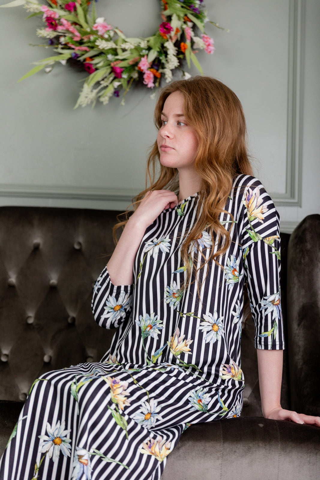 Model wearing the Nuggles® Heather Dress in Daisy Stripe