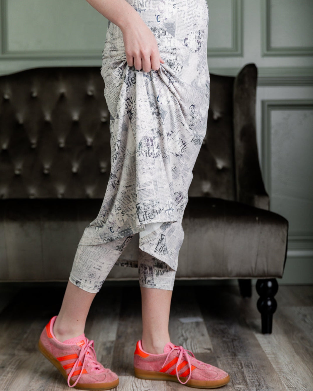 Model wearing Nuggles® 31" Sport Skirt in Whispering Headlines