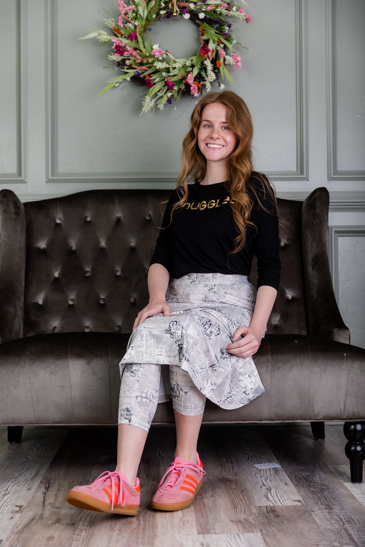 Model wearing Nuggles® 31" Sport Skirt in Whispering Headlines