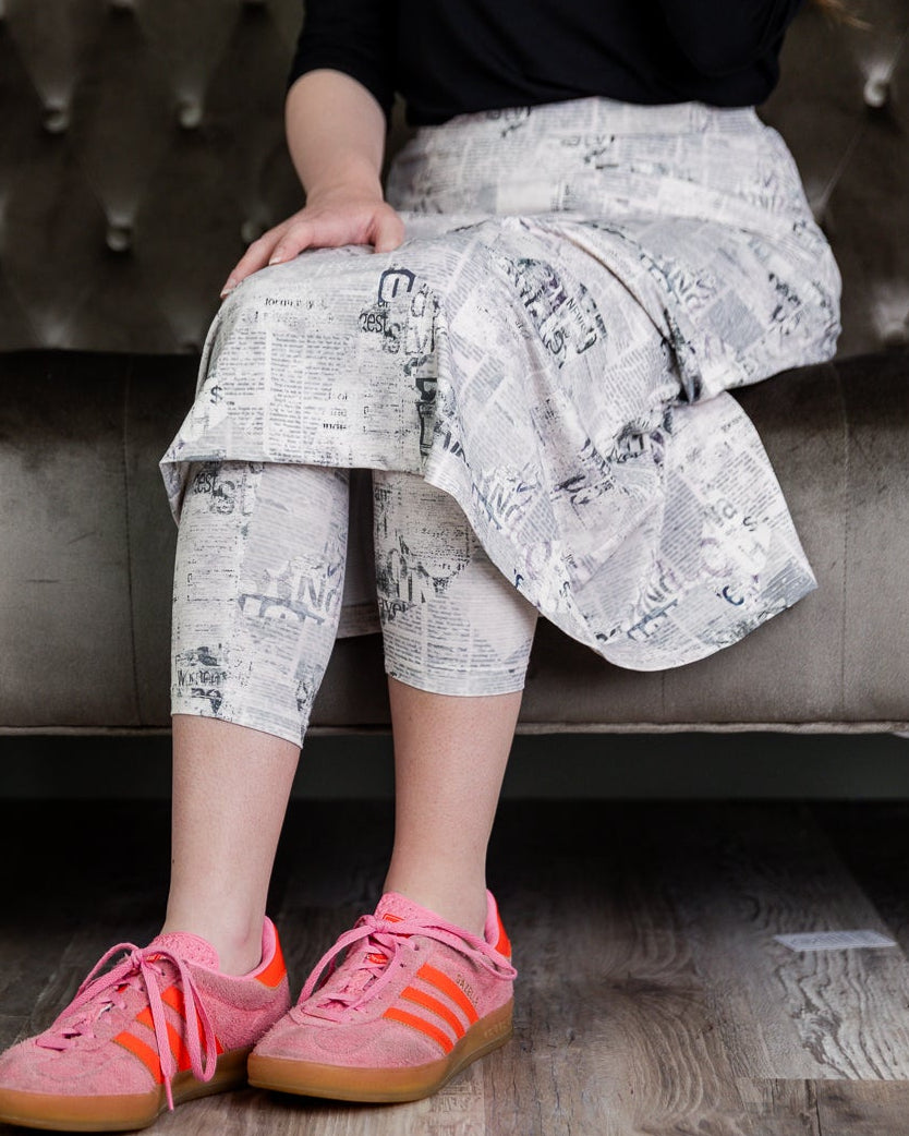 Model wearing Nuggles® 31" Sport Skirt in Whispering Headlines