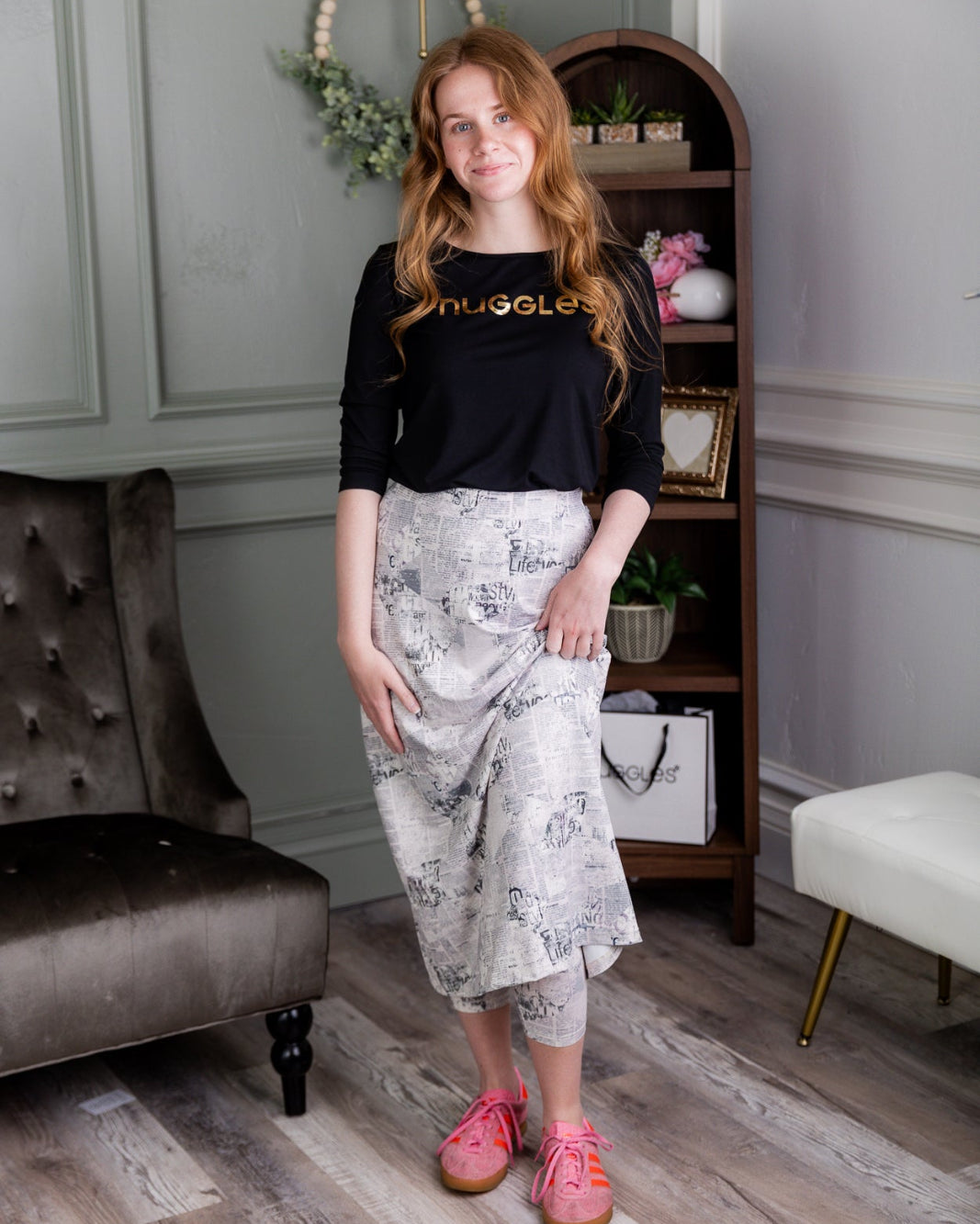 Model wearing Nuggles® 31" Sport Skirt in Whispering Headlines