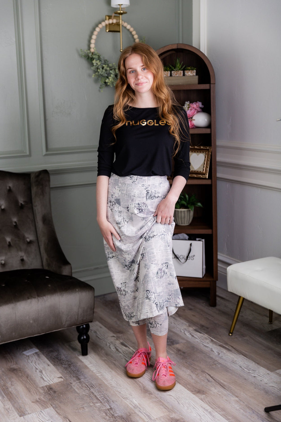Model wearing Nuggles® 31" Sport Skirt in Whispering Headlines