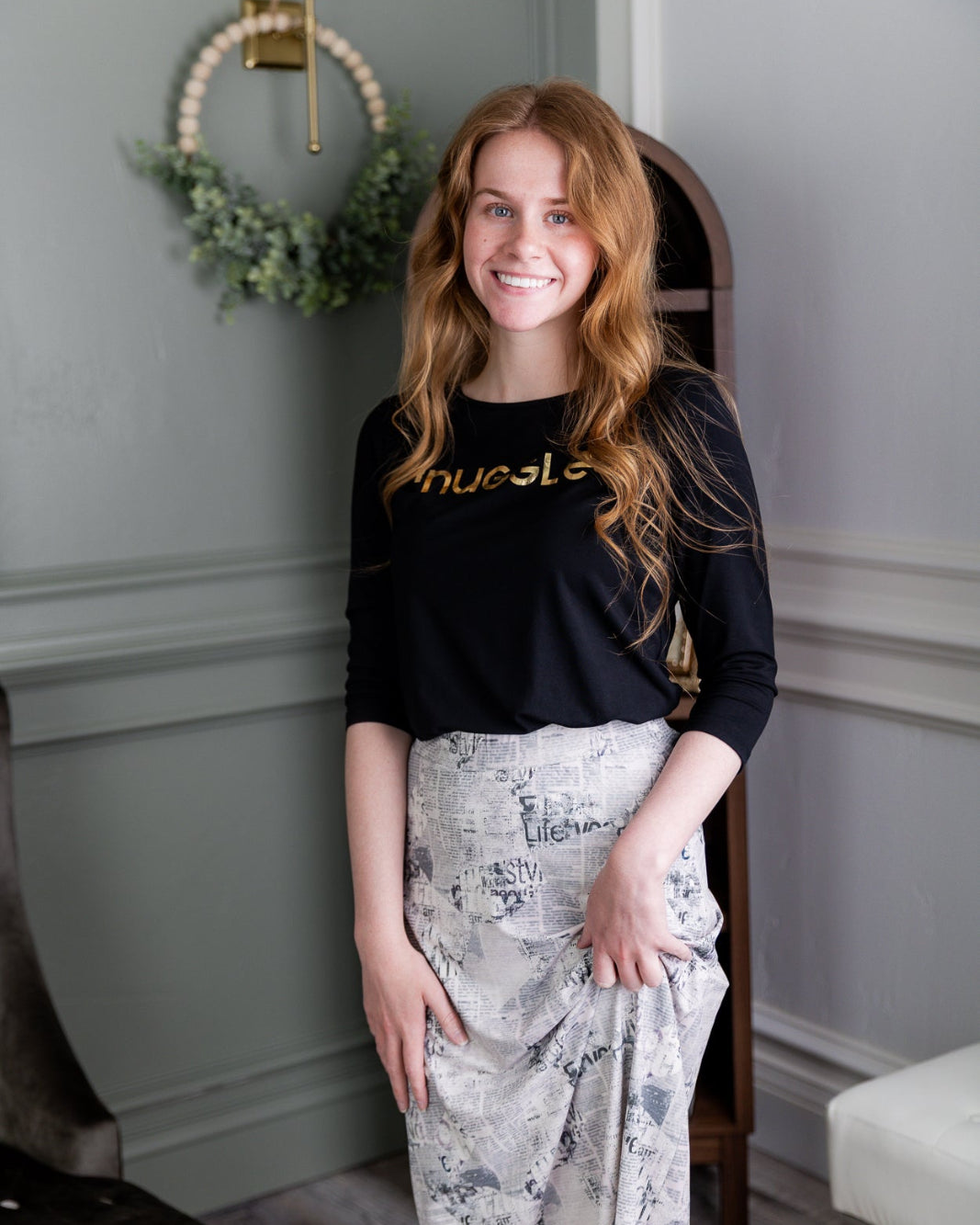 Model wearing Nuggles® 31" Sport Skirt in Whispering Headlines