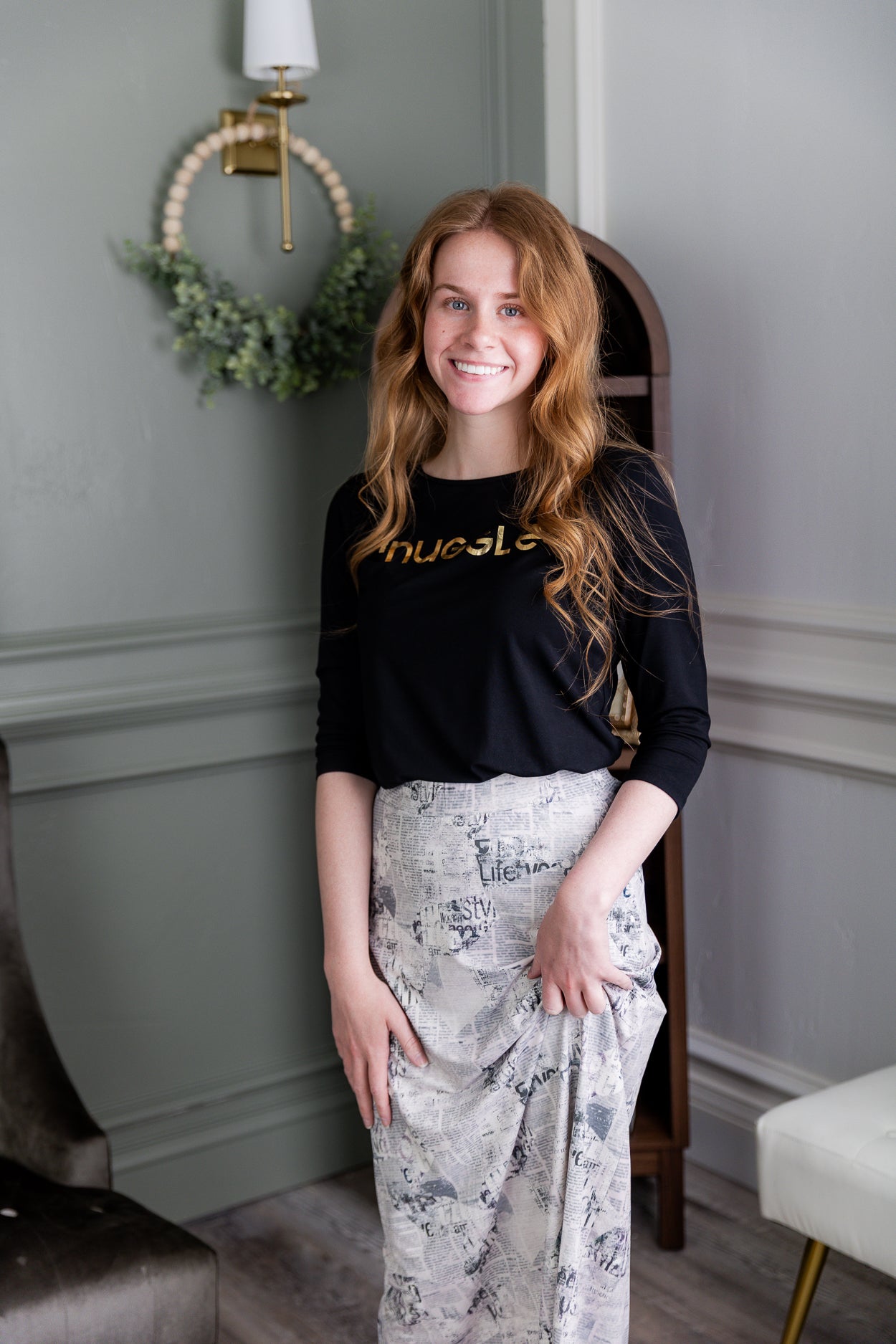 Model wearing Nuggles® 31" Sport Skirt in Whispering Headlines