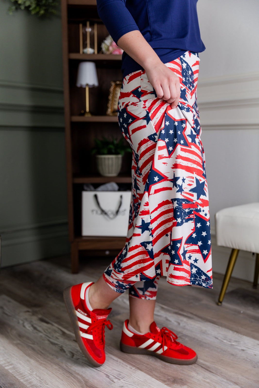 Model wearing the Nuggles® 31" All-Sport Skirt in Star-Spangled Parade