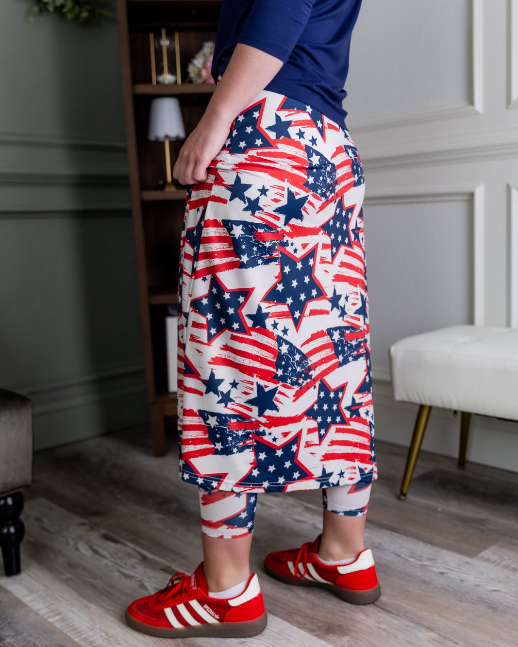 Model wearing the Nuggles® 31" All-Sport Skirt in Star-Spangled Parade