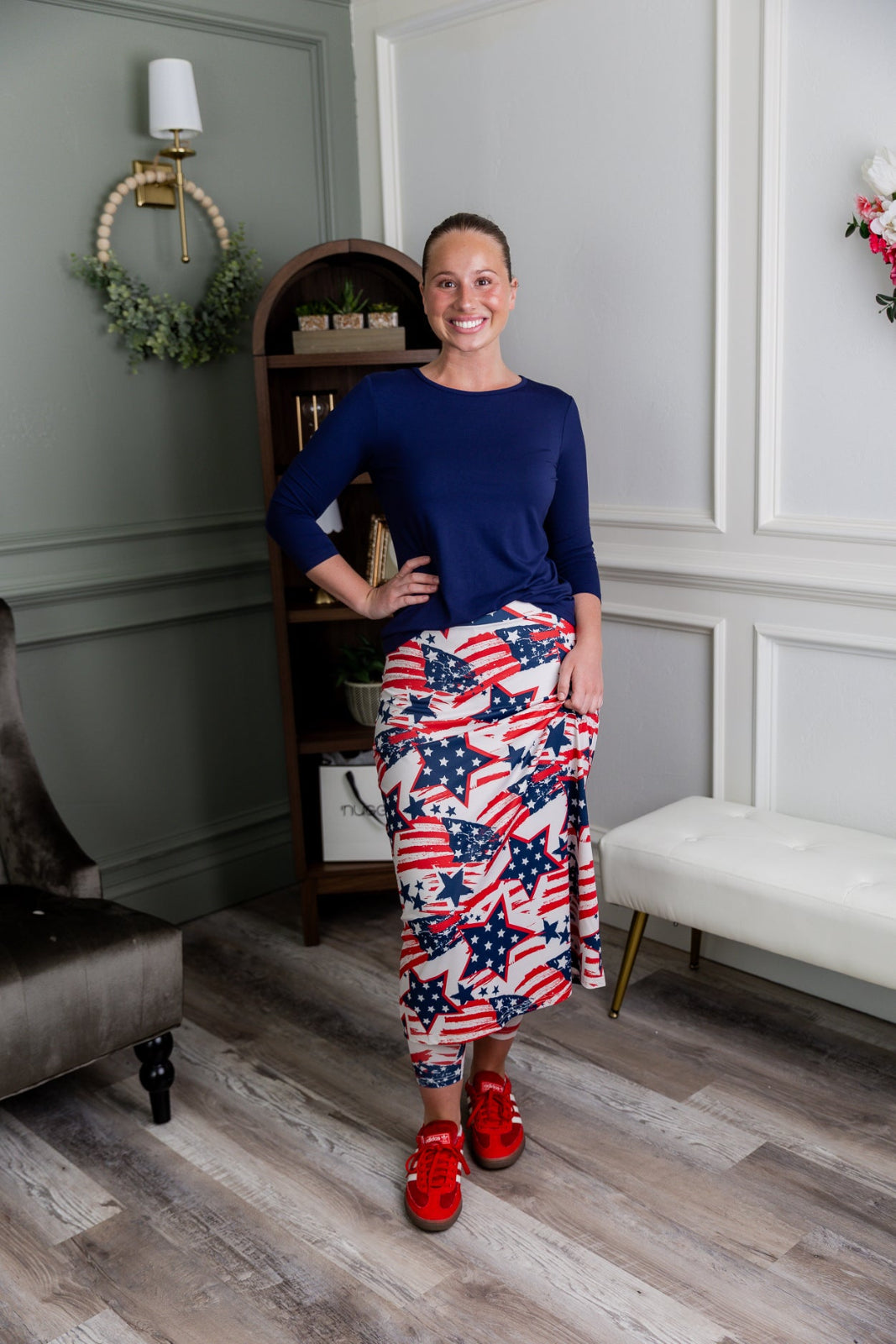 Model wearing the Nuggles® 31" All-Sport Skirt in Star-Spangled Parade