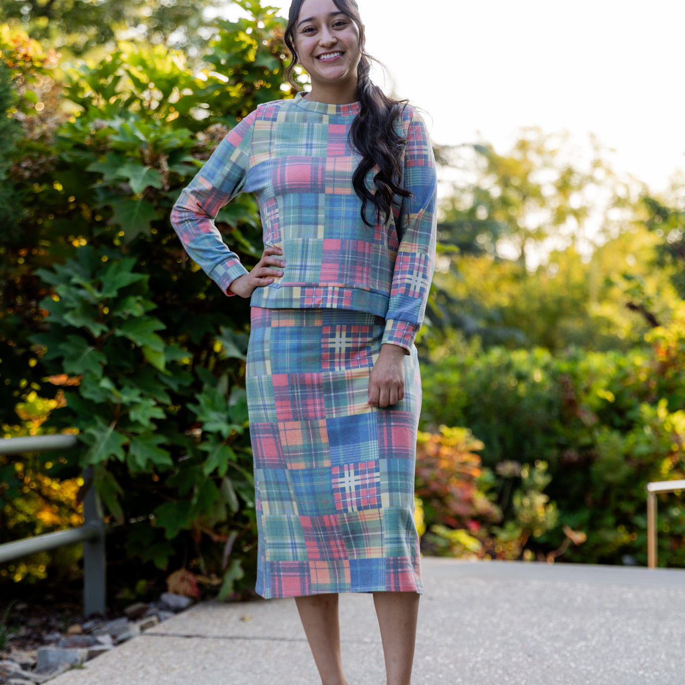 Nuggles® Iris two-piece set featuring soft knit midi skirt and crew-neck sweatshirt top