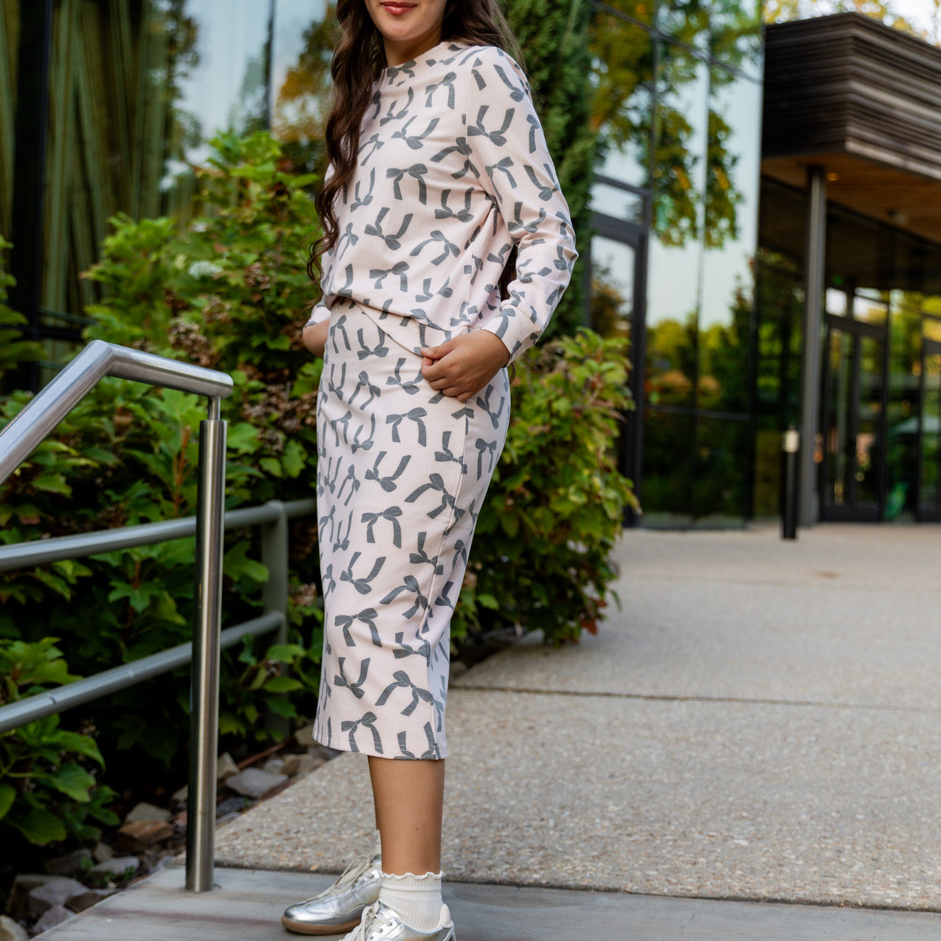 Nuggles® Iris two-piece set featuring soft knit midi skirt and crew-neck sweatshirt top