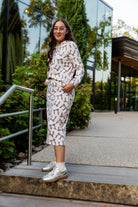 Nuggles® Iris two-piece set featuring soft knit midi skirt and crew-neck sweatshirt top