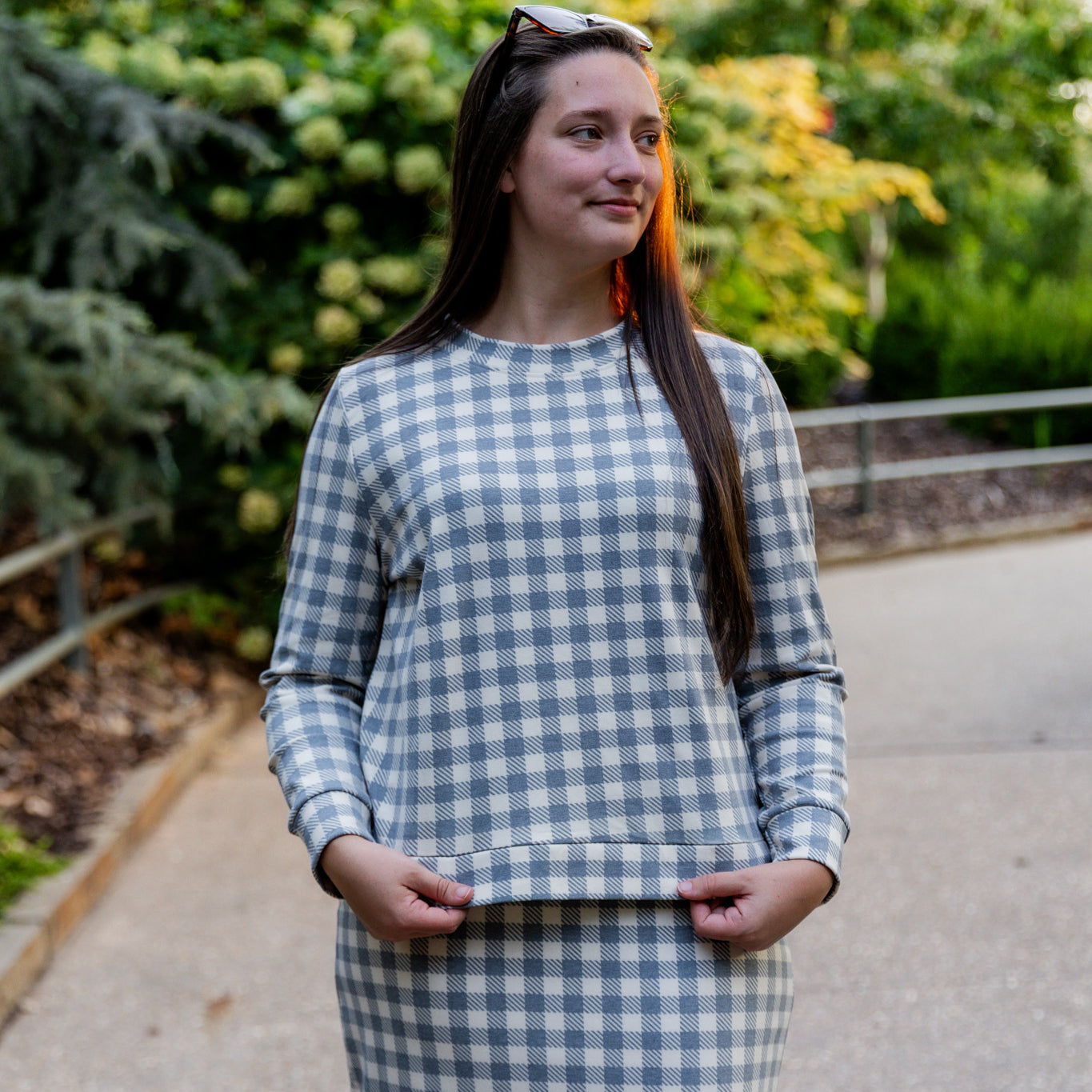Nuggles® Iris two-piece set featuring soft knit midi skirt and crew-neck sweatshirt top